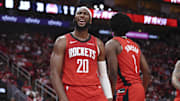 Oct 24, 2025; Houston, Texas, USA; Houston Rockets guard Josh Okogie (20) reacts after a play during the third quarter against the Detroit Pistons at Toyota Center. Mandatory Credit: Troy Taormina-Imagn Images
