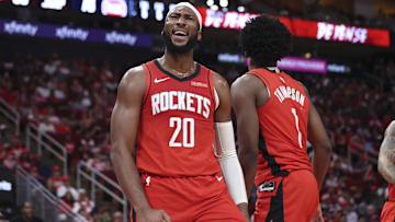 Oct 24, 2025; Houston, Texas, USA; Houston Rockets guard Josh Okogie (20) reacts after a play during the third quarter against the Detroit Pistons at Toyota Center. Mandatory Credit: Troy Taormina-Imagn Images