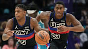 Oct 27, 2023; Charlotte, North Carolina, USA; Detroit Pistons guard Marcus Sasser (25) brings the ball up court with guard Jaden Ivey (23) against the Charlotte Hornets during the second half at Spectrum Center. Mandatory Credit: Jim Dedmon-Imagn Images