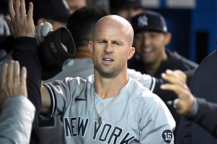New York Yankees center fielder Brett Gardner is greeted after hitting a solo home run against Toronto Blue Jays.