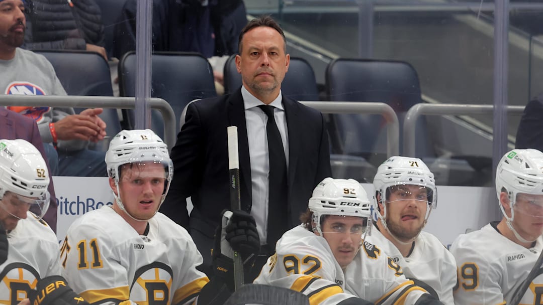 Nov 4, 2025; Elmont, New York, USA; Boston Bruins head coach Marco Sturm coaches against the New York Islanders during the first period at UBS Arena. Mandatory Credit: Brad Penner-Imagn Images