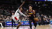 Dec 6, 2025; Washington, District of Columbia, USA; Atlanta Hawks forward Jalen Johnson (1) drives to the basket as Washington Wizards guard Bub Carrington (7) defends in the second half at Capital One Arena. Mandatory Credit: Geoff Burke-Imagn Images