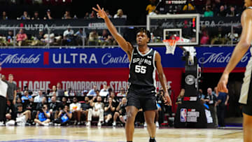 Jul 13, 2024; Las Vegas, NV, USA; San Antonio Spurs forward Harrison Ingram (55) gestures after scoring against the Portland Trail Blazers during the first quarter at Thomas & Mack Center. Mandatory Credit: Stephen R. Sylvanie-Imagn Images