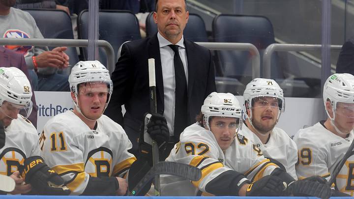 Nov 4, 2025; Elmont, New York, USA; Boston Bruins head coach Marco Sturm coaches against the New York Islanders during the first period at UBS Arena. Mandatory Credit: Brad Penner-Imagn Images