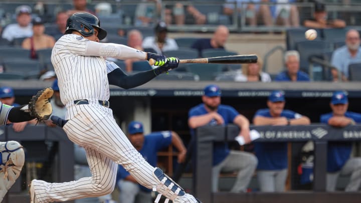 Aug 4, 2024; Bronx, New York, USA; New York Yankees right fielder Juan Soto (22) double during the eighth inning against the Toronto Blue Jays at Yankee Stadium. Mandatory Credit: Vincent Carchietta-USA TODAY Sports