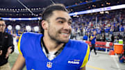 Jan 13, 2025; Glendale, AZ, USA; Los Angeles Rams wide receiver Puka Nacua (17) celebrates after defeating the Minnesota Vikings during an NFC wild card game at State Farm Stadium. Mandatory Credit: Mark J. Rebilas-Imagn Images