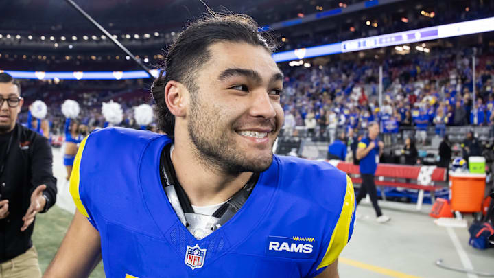 Jan 13, 2025; Glendale, AZ, USA; Los Angeles Rams wide receiver Puka Nacua (17) celebrates after defeating the Minnesota Vikings during an NFC wild card game at State Farm Stadium. Mandatory Credit: Mark J. Rebilas-Imagn Images Jan 13, 2025; Glendale, AZ, USA; Los Angeles Rams wide receiver Puka Nacua (17) celebrates after defeating the Minnesota Vikings during an NFC wild card game at State Farm Stadium. Mandatory Credit: Mark J. Rebilas-Imagn Images