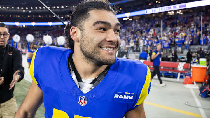 Los Angeles Rams wide receiver Puka Nacua (17) celebrates after defeating the Minnesota Vikings during an NFC wild card game at State Farm Stadium.