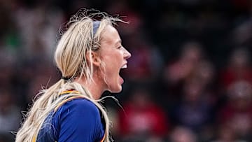 Indiana Fever Sophie Cunningham (8) gets the crowd excited Saturday, May 3, 2025, during a preseason game between the Indiana Fever and the Washington Mystics at Gainbridge Fieldhouse in Indianapolis.