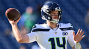 Nov 23, 2025; Nashville, Tennessee, USA;  Seattle Seahawks quarterback Sam Darnold (14) warms up before a game against the Tennessee Titans at Nissan Stadium. Mandatory Credit: Steve Roberts-Imagn Images
