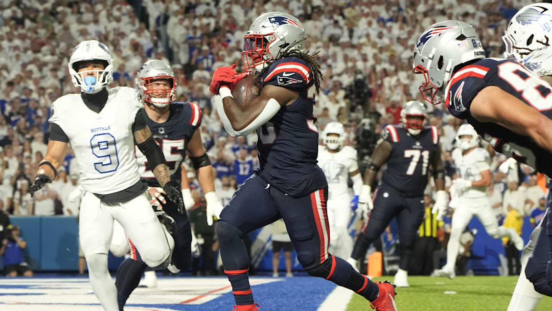 Oct 5, 2025; Orchard Park, New York, USA; New England Patriots running back Rhamondre Stevenson (38) rushes for a touchdown against the Buffalo Bills during the second half at Highmark Stadium. Mandatory Credit: Gregory Fisher-Imagn Images