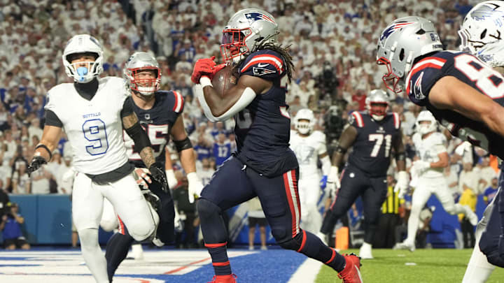 Oct 5, 2025; Orchard Park, New York, USA; New England Patriots running back Rhamondre Stevenson (38) rushes for a touchdown against the Buffalo Bills during the second half at Highmark Stadium. Mandatory Credit: Gregory Fisher-Imagn Images