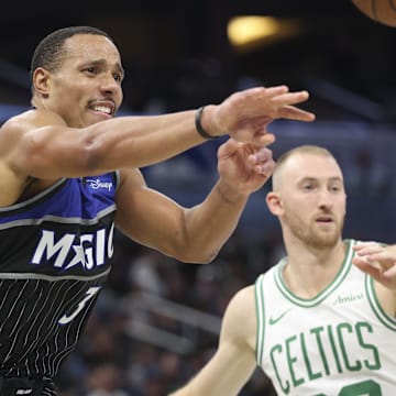 Nov 7, 2025; Orlando, Florida, USA; Orlando Magic guard Desmond Bane (3) passes the ball against the Boston Celtics in the third quarter at Kia Center. Mandatory Credit: Nathan Ray Seebeck-Imagn Images