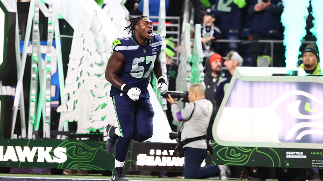 Jan 17, 2026; Seattle, WA, USA; Seattle Seahawks offensive tackle Charles Cross (67) takes the field prior to a game against the San Francisco 49ers in an NFC Divisional Round game at Lumen Field. Mandatory Credit: Kevin Ng-Imagn Images