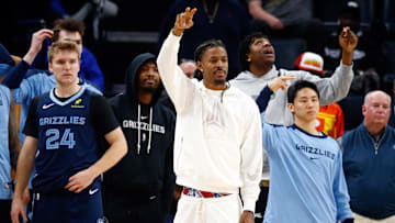 Nov 20, 2024; Memphis, Tennessee, USA; Memphis Grizzlies guard Cam Spencer (24), guard Marcus Smart (36), guard Ja Morant (12), forward GG Jackson II (45) and  guard Yuki Kawamura (17) react from the bench during the second half against the  Philadelphia 76ers  at FedExForum. Mandatory Credit: Petre Thomas-Imagn Images