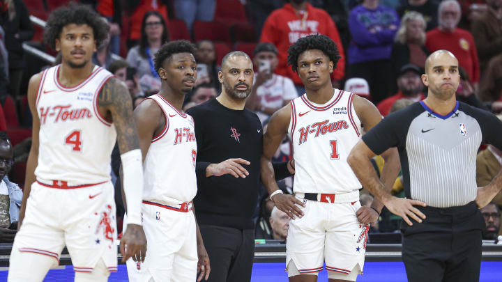 Jan 20, 2024; Houston, Texas, USA; Houston Rockets head coach Ime Udoka looks on with players during overtime at Toyota Center. Mandatory Credit: Troy Taormina-USA TODAY Sports