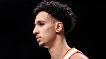 Zaccharie Risacher #10 of the Atlanta Hawks looks on against the Brooklyn Nets.