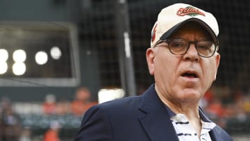 Jun 28, 2024; Baltimore, Maryland, USA; Baltimore Orioles owner David Rubenstein on the field before the game against the Texas Rangers  at Oriole Park at Camden Yards