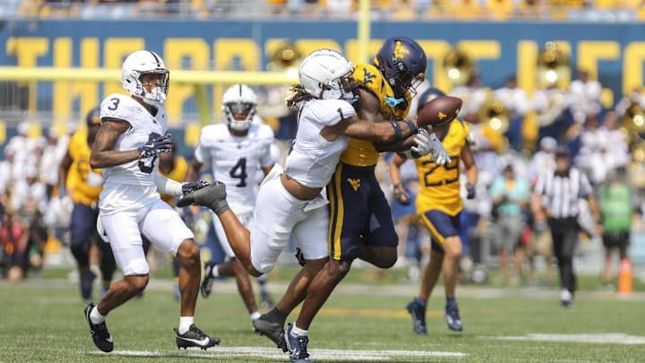 Penn State safety Jaylen Reed (1) breaks up a pass intended for West Virginia receiver Traylon Ray. 