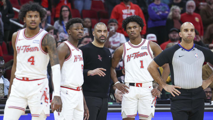 Jan 20, 2024; Houston, Texas, USA; Houston Rockets head coach Ime Udoka looks on with players during overtime at Toyota Center. Mandatory Credit: Troy Taormina-USA TODAY Sports