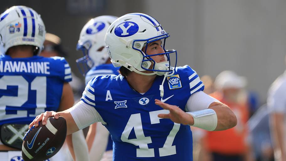 BYU quarterback Bear Bachmeier works out prior to a game.