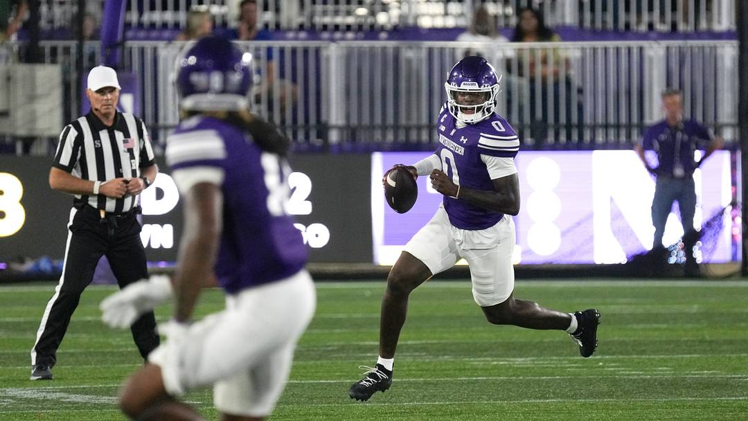Sep 5, 2026; Evanston, Illinois, USA; Northwestern Wildcats quarterback Aidan Chiles (0) scrambles against the South Dakota State Jackrabbits during the first half at Northwestern Medicine Field at Martin Stadium. Mandatory Credit: David Banks-Imagn Images Sep 5, 2026; Evanston, Illinois, USA; Northwestern Wildcats quarterback Aidan Chiles (0) scrambles against the South Dakota State Jackrabbits during the first half at Northwestern Medicine Field at Martin Stadium. Mandatory Credit: David Banks-Imagn Images