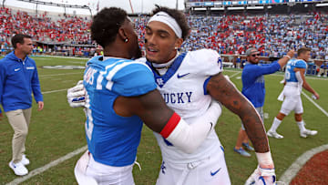 Sep 28, 2024; Oxford, Mississippi, USA; Mississippi Rebels defensive back Trey Amos (9) and Kentucky Wildcats wide receiver Dane Key (6) embrace after the game at Vaught-Hemingway Stadium. Mandatory Credit: Petre Thomas-Imagn Images