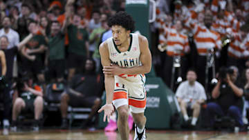 Feb 10, 2024; Coral Gables, Florida, USA; Miami Hurricanes guard Nijel Pack (24) reacts after scoring against the North Carolina Tar Heels during the first half at Watsco Center. Mandatory Credit: Sam Navarro-Imagn Images