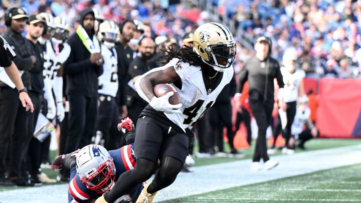 Oct 8, 2023; Foxborough, Massachusetts, USA; New Orleans Saints running back Alvin Kamara (41) breaks a tackle from New England Patriots linebacker Ja'Whaun Bentley (8) during the second half at Gillette Stadium. Mandatory Credit: Brian Fluharty-USA TODAY Sports Oct 8, 2023; Foxborough, Massachusetts, USA; New Orleans Saints running back Alvin Kamara (41) breaks a tackle from New England Patriots linebacker Ja'Whaun Bentley (8) during the second half at Gillette Stadium. Mandatory Credit: Brian Fluharty-USA TODAY Sports