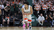 Feb 10, 2024; Coral Gables, Florida, USA; Miami Hurricanes guard Nijel Pack (24) reacts after scoring against the North Carolina Tar Heels during the first half at Watsco Center. Mandatory Credit: Sam Navarro-Imagn Images