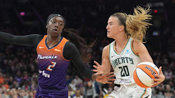 Jun 27, 2025; Phoenix, Arizona, USA; Phoenix Mercury guard Kahleah Copper (2) guards New York Liberty guard Sabrina Ionescu (20) during the second half at Footprint Center. Mandatory Credit: Joe Camporeale-Imagn Images