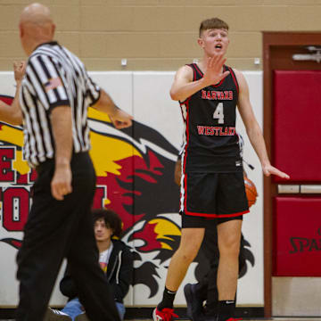 Nikolas Khamenia (4) tells his coach he is fine to stay in the game at the Hoophall West final Chaparral High School gym the Chaparral High School gym on Dec. 2, 2023.