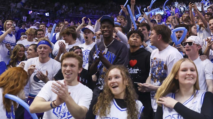 Brigham Young Cougars star Aj Dybantsa joins the student section during a game against the West Virginia Mountaineers