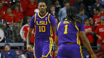Jan 11, 2025; Oxford, Mississippi, USA; LSU Tigers forward Daimion Collins (10) reacts with guard Jordan Sears (1) during the second half against the Mississippi Rebels at The Sandy and John Black Pavilion at Ole Miss. Mandatory Credit: Petre Thomas-Imagn Images