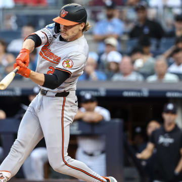 Jun 19, 2024; Bronx, New York, USA;  Baltimore Orioles shortstop Gunnar Henderson (2) hits a double in the first inning against the New York Yankees at Yankee Stadium.