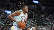 Dec 8, 2024; San Antonio, Texas, USA; San Antonio Spurs center Charles Bassey (28) rebounds in the first half against the New Orleans Pelicans at Frost Bank Center.