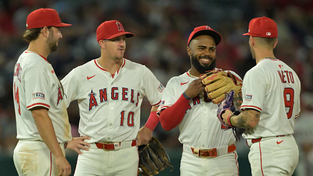 Jul 28, 2025; Anaheim, California, USA; Los Angeles Angels first baseman Nolan Schanuel (18), third baseman Kevin Newman (10), third baseman Luis Rengifo (2) and shortstop Zach Neto (9) talk on the field during a pitching change against the Texas Rangers at Angel Stadium. Mandatory Credit: Jayne Kamin-Oncea-Imagn Images