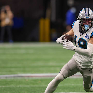 Thielen runs after a catch. 