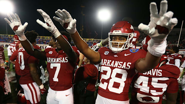 Arkansas players celebrate during the 2024 Liberty Bow