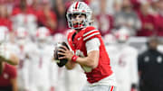 Ohio State Buckeyes quarterback Julian Sayin (10) drops back to pass during the first half of the Big Ten Conference championship game against the Indiana Hoosiers at Lucas Oil Stadium in Indianapolis on Dec. 6, 2025.