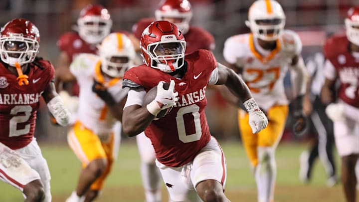 Oct 5, 2024; Fayetteville, Arkansas, USA; Arkansas Razorbacks running back Braylen Russell (0) rushes in the fourth quarter against the Tennessee Volunteers at Donald W. Reynolds Razorback Stadium. Arkansas won 19-14. Mandatory Credit: Nelson Chenault-Imagn Images