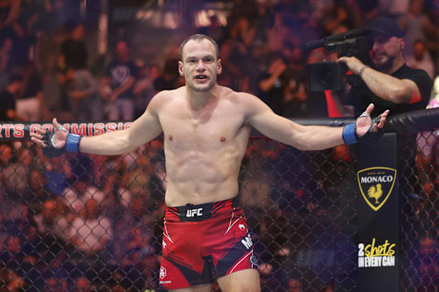 Uros Medic (blue gloves) reacts to defeating Matthew Semelsberger (red gloves) during UFC 291 at Delta Center. 