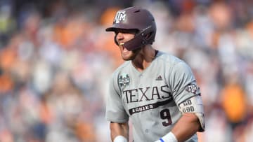 Texas A&M's Gavin Grahovac (9) celebrates an RBI-single during game three of the NCAA College World Series finals between Tennessee and Texas A&M at Charles Schwab Field in Omaha, Neb., on Monday, June 24, 2024.