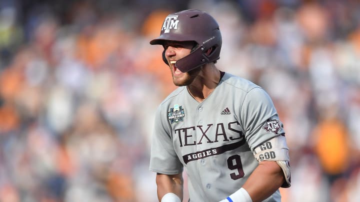 Texas A&M's Gavin Grahovac (9) celebrates an RBI-single during game three of the NCAA College World Series finals between Tennessee and Texas A&M at Charles Schwab Field in Omaha, Neb., on Monday, June 24, 2024.