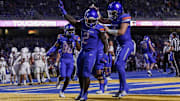 Boise State Broncos running back Ashton Jeanty and quarterback Maddux Madsen celebrate.