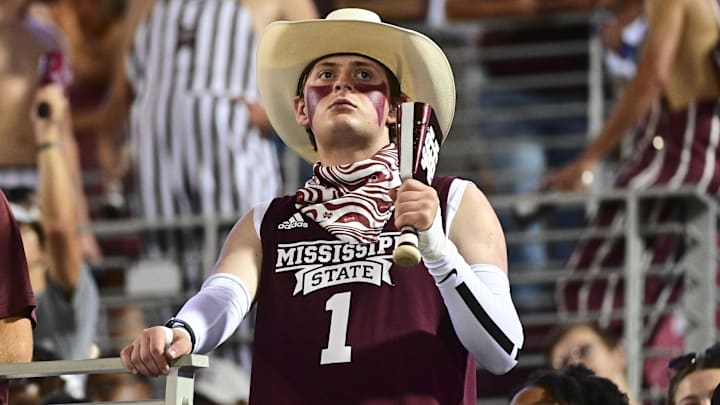 A Mississippi State Bulldogs fan reacts after a play during the second quarter of the game against the Toledo Rockets at Davis Wade Stadium at Scott Field.