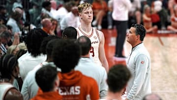 Texas Longhorns head coach Sean Miller takes out center Matas Vokietaitis (8) during the second half against the Rider Broncs at Moody Center. 