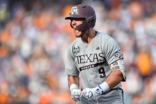 Texas A&M's Gavin Grahovac (9) celebrates an RBI-single during Game 3 of the NCAA College World Series Final.