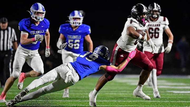 Ballard runs from the tackle attempt by Oldham County during the second half of their game, Friday, Oct. 17 2025 in Buckner Ky. Ballard won 22-0.