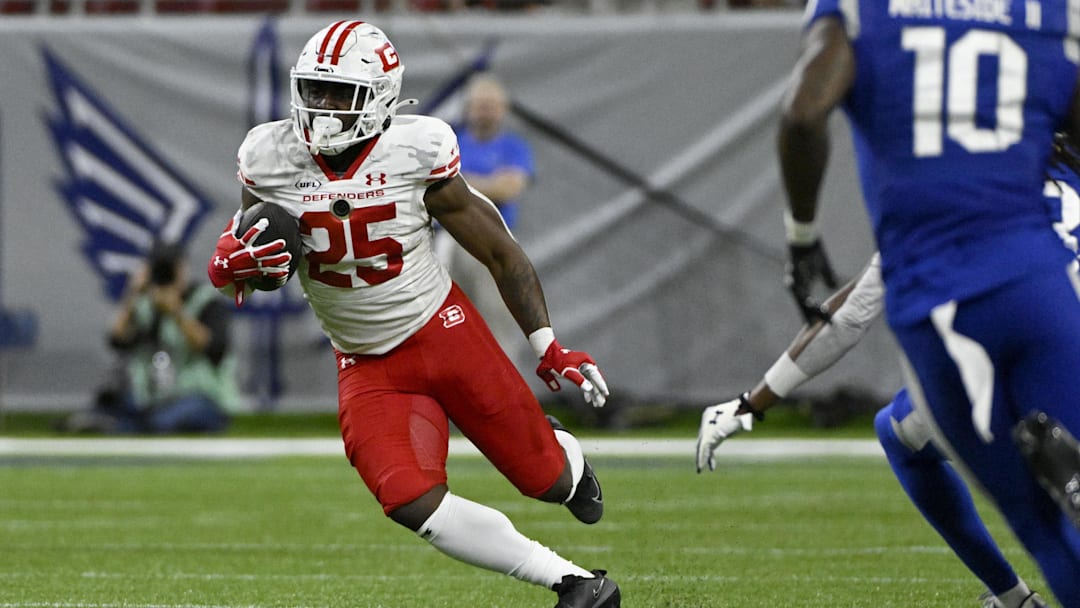 Jun 8, 2025; St. Louis, MO, USA; DC Defenders running back Deon Jackson (25) runs the ball against the St. Louis Battlehawks during the first quarter at The Dome at America’s Center.